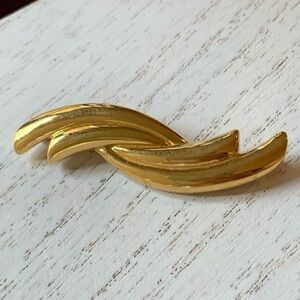 Monet Gold Tone Curved Band Brooch